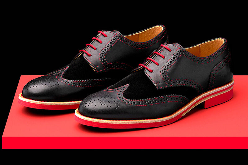 red and black wingtip shoes