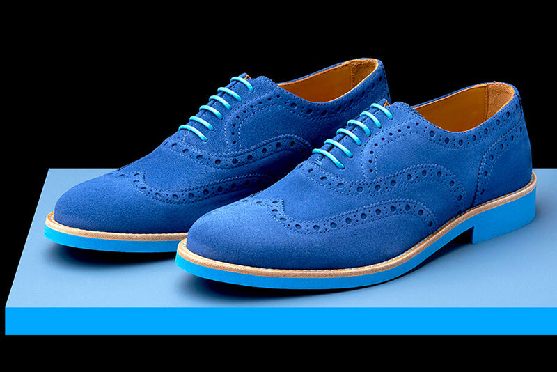 blue wingtip shoes