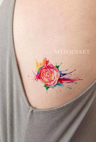 Women’s Unique Small Melting Rose Rib Tattoo Ideas for Teen Girls Colorful Rainbow Watercolor Splat Side Tat - arco iris rosa costilla tatuaje ideas para mujeres - www.MyBodiArt.com #tattoos