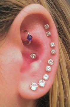 Multiple Ear Piercings to Try This Summer - Rook Piercing, Cartilage Piercing, Helix Piercing at MyBodiArt