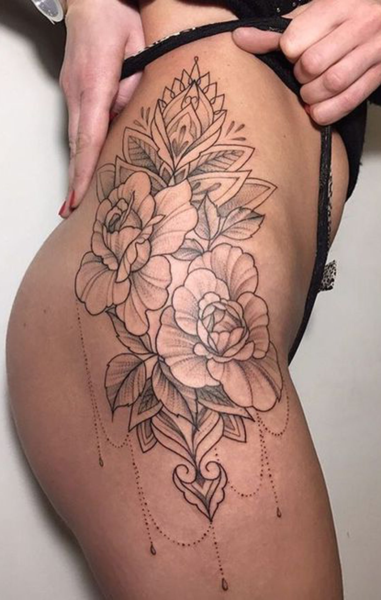 Delicate Floral Flower Hip Tattoo Ideas for Women - Women's Lotus Chandelier Thigh Tat -  tatuaje de la delicada flor de la mujer - www.MyBodiArt.com