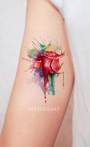 Women’s Unique Small Melting Rose Arm Tattoo Ideas for Teen Girls Colorful Rainbow Watercolor Splat Bicep Tat - ideas de tatuaje arco iris rosa brazo para mujeres  - www.MyBodiArt.com #tattoos