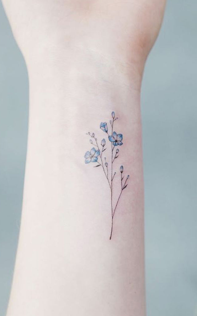 Wildflower Blue Watercolor Wrist Tattoo Ideas for Women -  Ideas de tatuaje de flores para mujeres - www.MyBodiArt.com