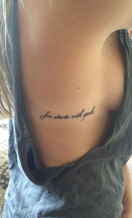 Black Cursive Script Quote Tattoo Ideas - Fire Starts with Sparks ideas de tatuajes para mujeres - www.MyBodiArt.com