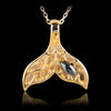 Hematite filigree whale tail necklace