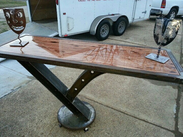 Searching Pinterest reveals incredible furniture such as these tables built by fabricators that are examples of incredible wood work and metal work.