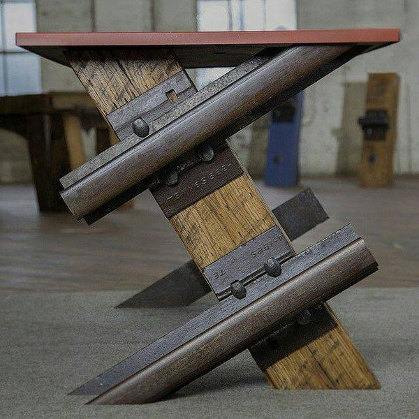 Searching Pinterest reveals incredible furniture such as these tables built by fabricators that are examples of incredible wood work and metal work.