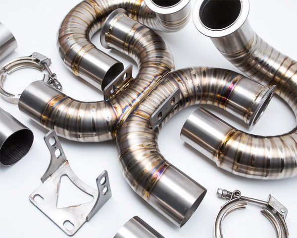 Titanium versus stainless exhaust systems where weight, price, appearance and sound all matter with companies like Agency Power, Ticon Industries, Corsa, Injen, Flowmaster, Spintech and many more making incredible systems out of both materials.