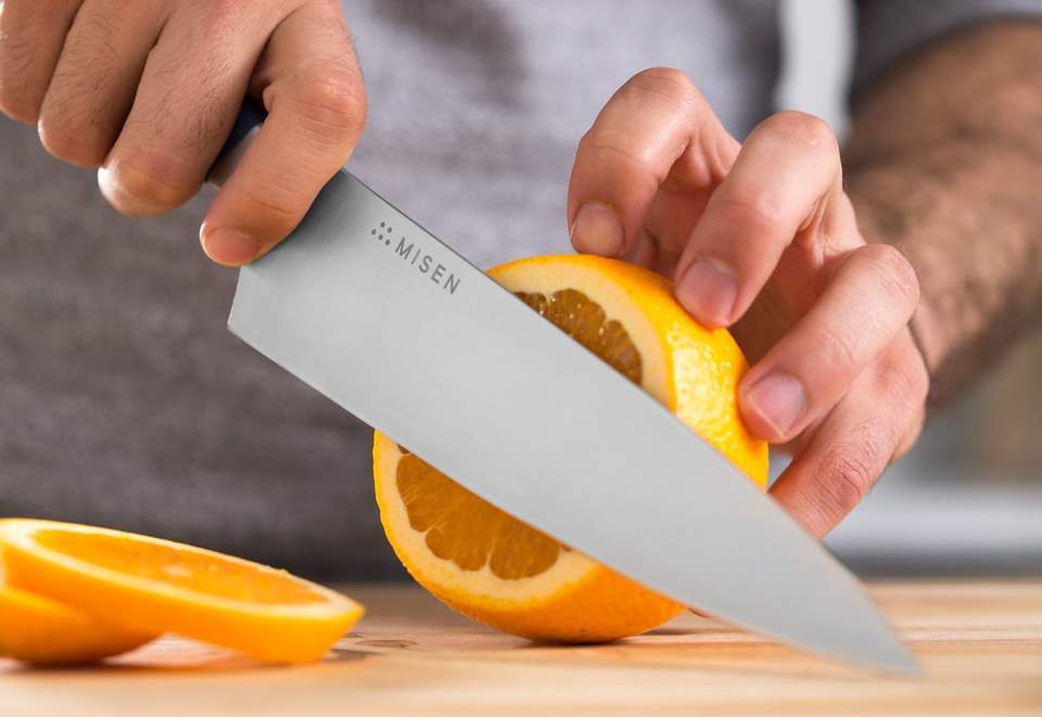 Batonnet cut: A cook slices grapefruit