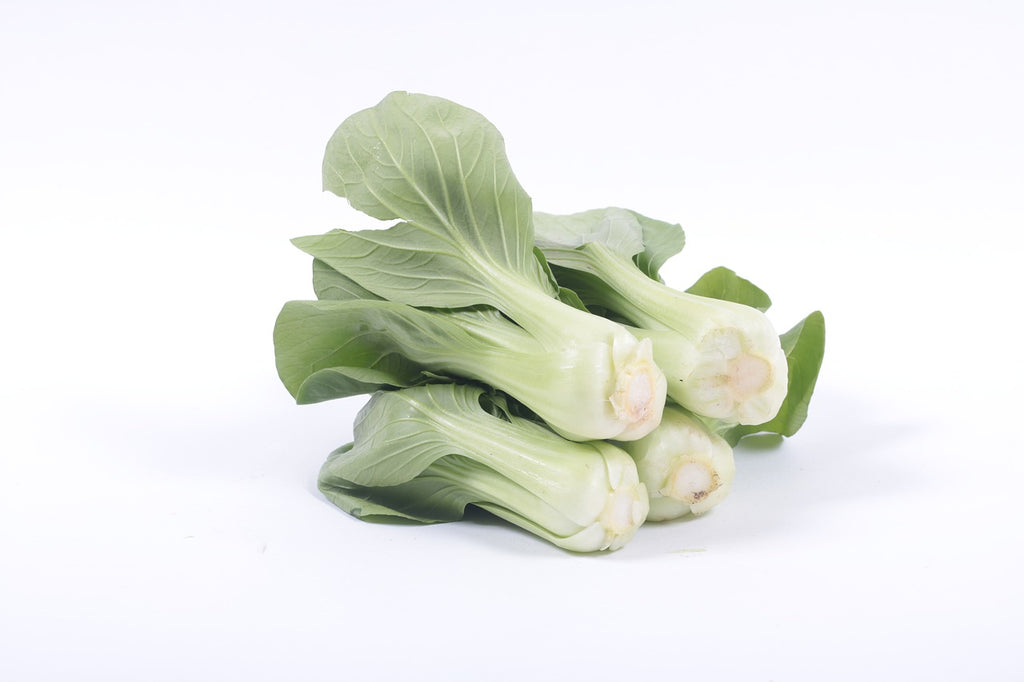 How to cut bok choy: three whole heads of bok choy