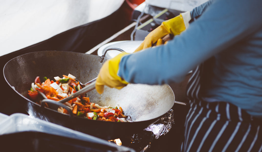How to cut bok choy: A cook prepares bok choy in a stir-fry