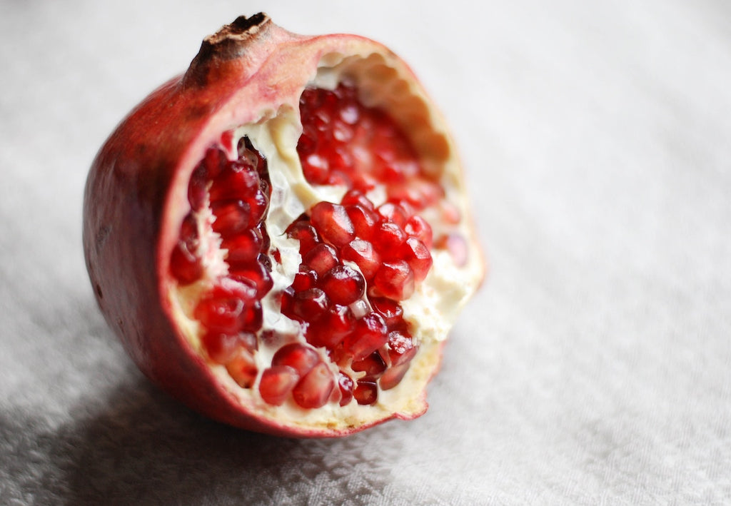 How to cut a pomegranate: a section of a pomegranate ready to be deseeded