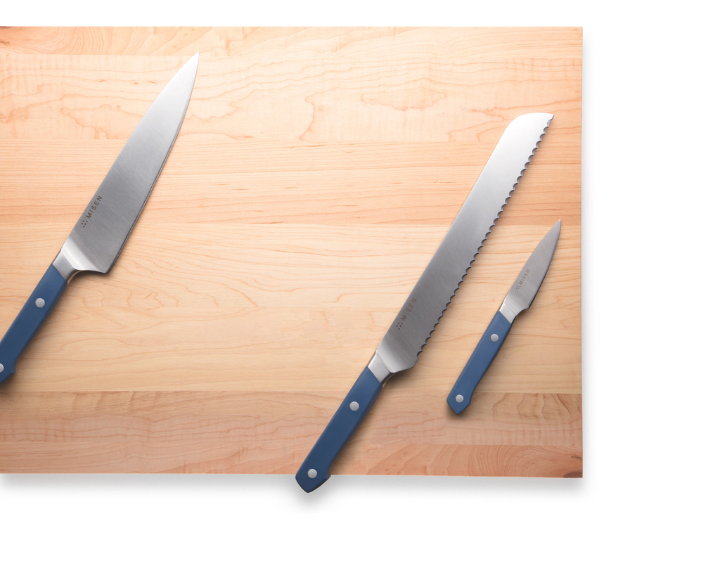 knives on a cutting board 
