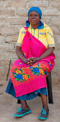 Anna Mashaba - Kaross embroiderer since 1993 - in traditional dress with nceka