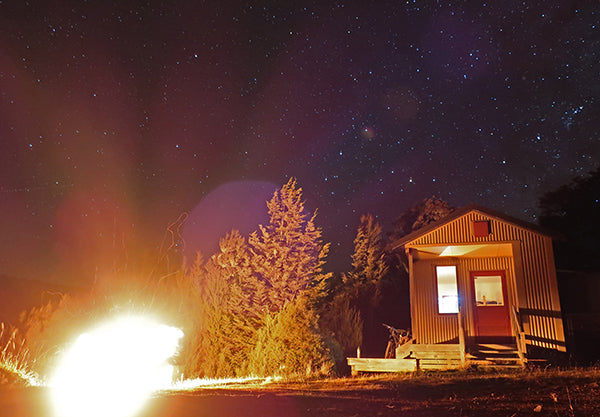 Fire blazing and Red Hills Hut