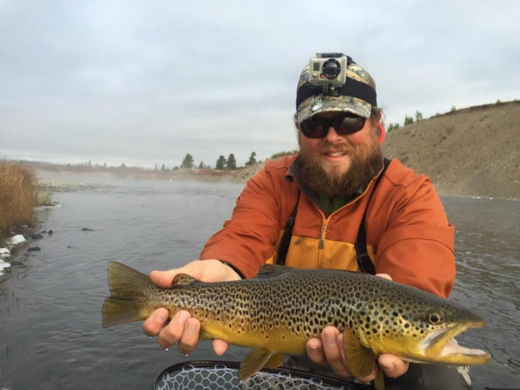Chris Daniel Fly Fishing with a Brown Trout on the Madison River in Yellowstone National Park