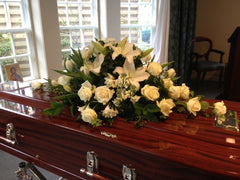 funeral casket sympathy flowers