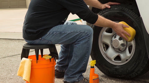 The Original Bucket Stool™ being used for car detailing. Click to see car detailing solutions page.