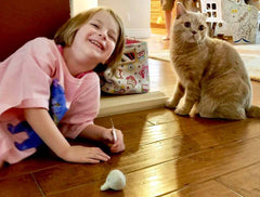 Whitney and Huckle with Garlic Cat Toy