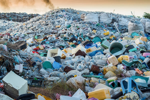 Landfill site showing mountains of plastic waste