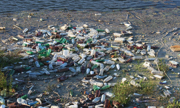 Embankment strewn with plastic waste