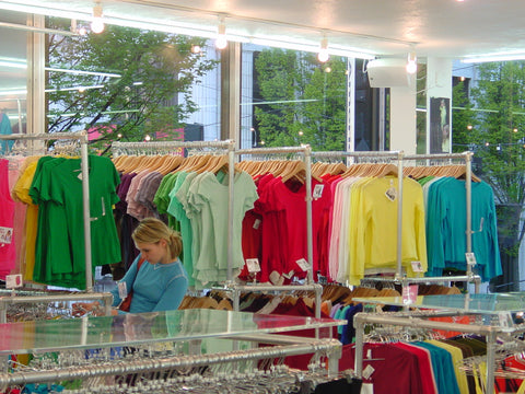 Clothes shop exhibiting a wide range of colours