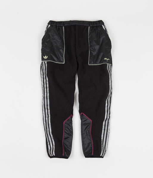 black and yellow adidas track pants