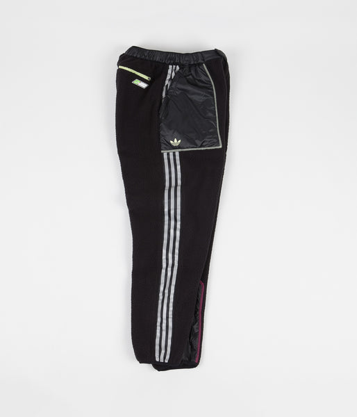 black and yellow adidas track pants