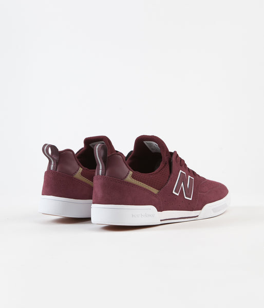 new balance numeric 247 classic white and burgundy shoes