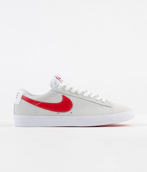 nike white sneakers with red tick