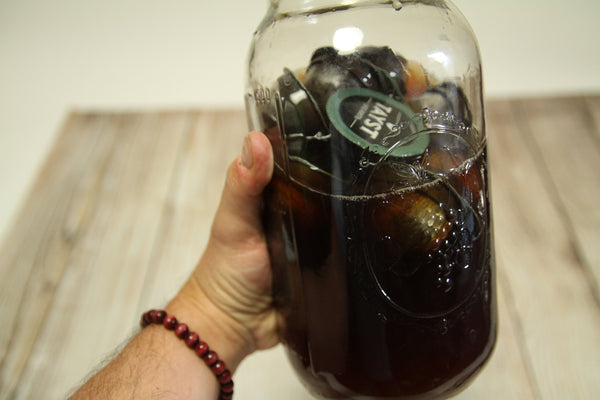 Mason jar filled with Tayst coffee pods to make cold brew coffee