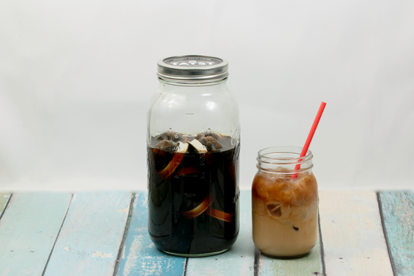 mason jars filled with iced coffee and tayst coffee pods