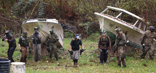 Paintball player readies his troops for the charge