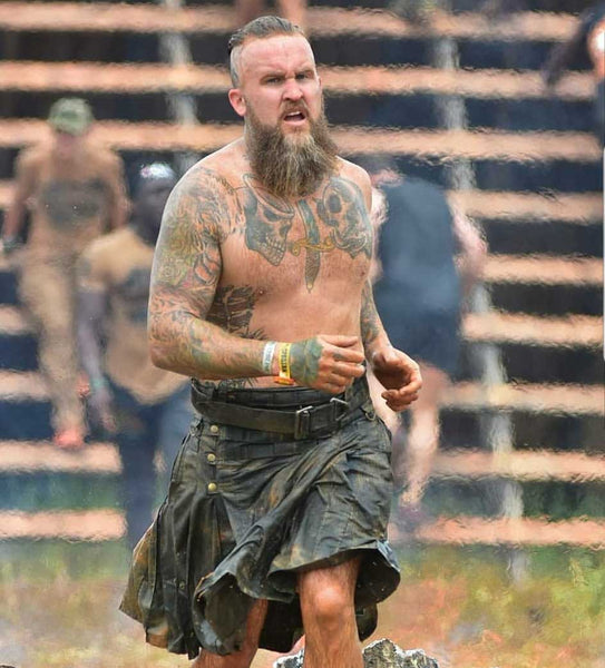 running muddy buddy and mud run races in a kilt