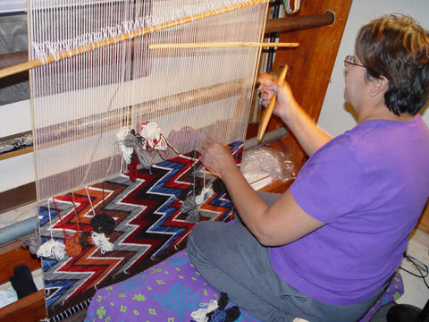 Frances Begay weaving an Eye Dazzler Navajo rug
