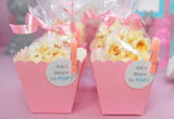 alt="ready to pop baby shower favour, popcorn in a scalloped treatbox inside cello bag sealed with ribbon and label"