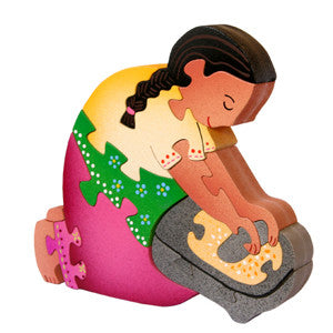 Señora con metate
