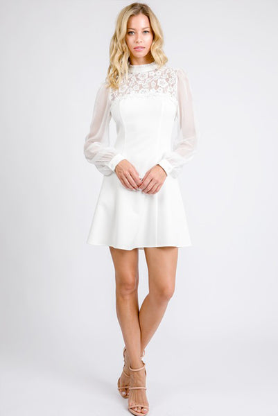 white long sleeve fit and flare dress