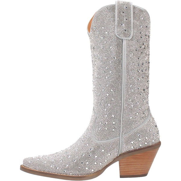 A mid calf length white boot with rhinestones from top to bottom, matching leather straps, a short heel, and a V cut at the top. Item is pictured on a white background