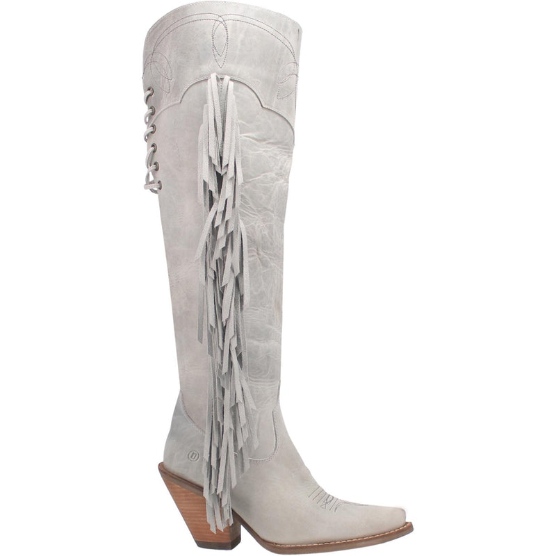 A tall white leather boot with a short heel, stitched desings at the top and bottom, lace up back, fringe down the right side, and a half zipper. Item is pictured on a plain white background