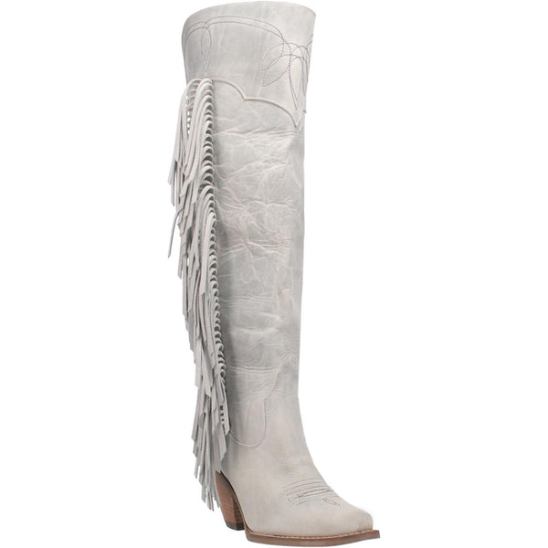 A tall white leather boot with a short heel, stitched desings at the top and bottom, lace up back, fringe down the right side, and a half zipper. Item is pictured on a plain white background