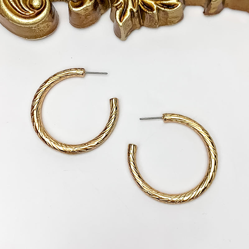Gold Tone Large Twisted Hoop Earrings