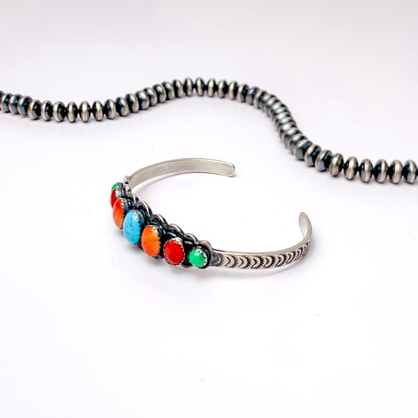 Russell Sam | Detailed Sterling Silver Cuff with Seven Multi-Colored Turquoise Stones