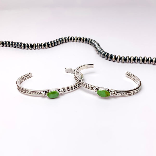 June Delauito | Navajo Handmade Sterling Silver Cuff Bracelet with a Single Green Turquoise Stone and Intricate Detailing