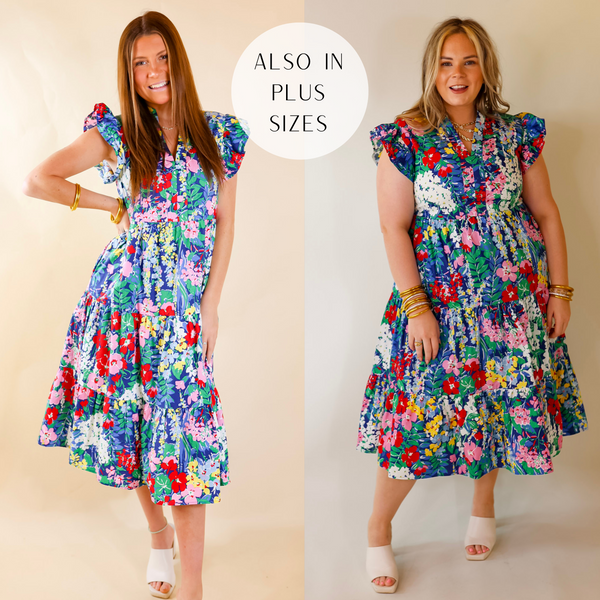 Model is wearing a midi length dress with a floral print and ruffle cap sleeves in blue. Model has this dress paired with gold jewelry and white heels. Background is solid tan.