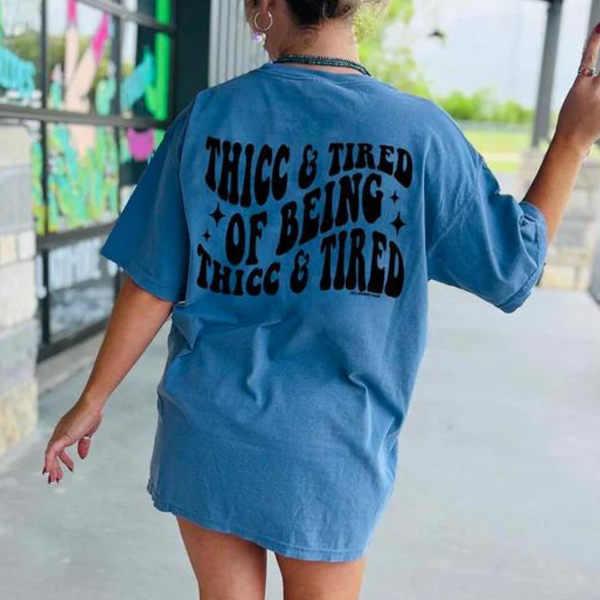 Thicc & Tired Of Being Thicc & Tired  Short Sleeve Graphic Tee in Blue Jean