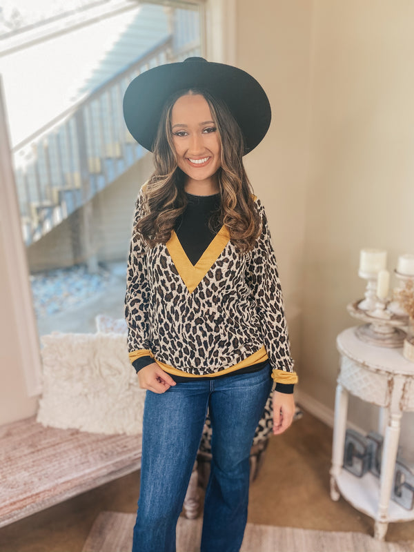 A Wild Mindset Leopard and Black Color Block Top with Yellow Trim