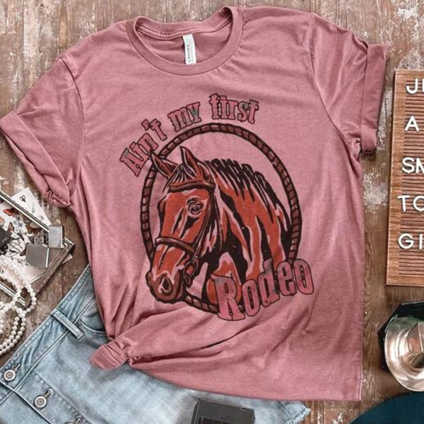 Ain't My First Rodeo Short Sleeve Graphic Tee in Mauve Pink