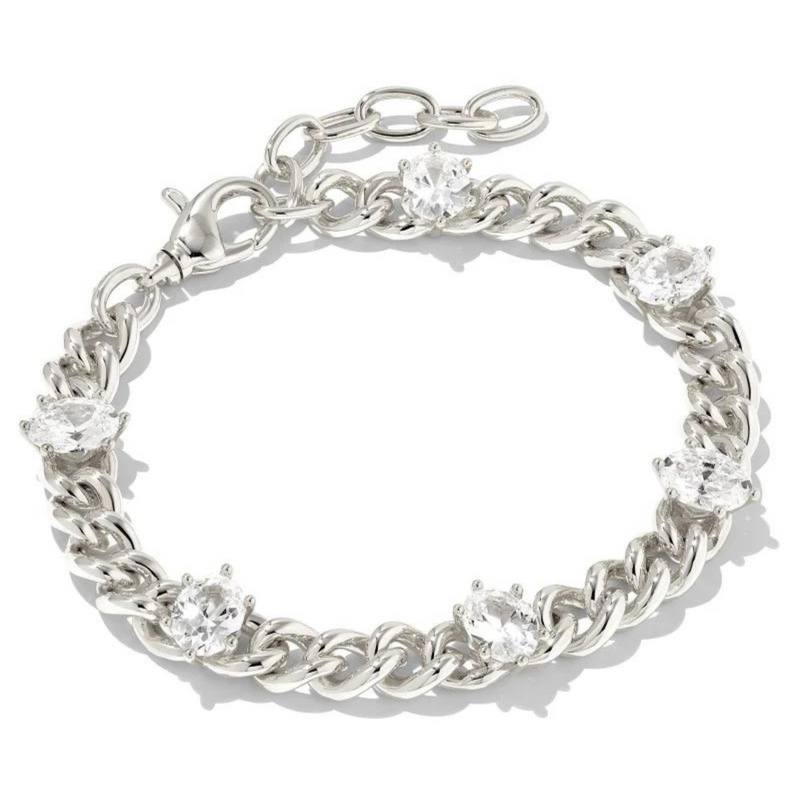 Silver chain bracelet with white crystals, pictured on a white background.