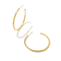 Gold hoop earrings pictured on a white background.